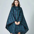 Poncho pluie à carreaux